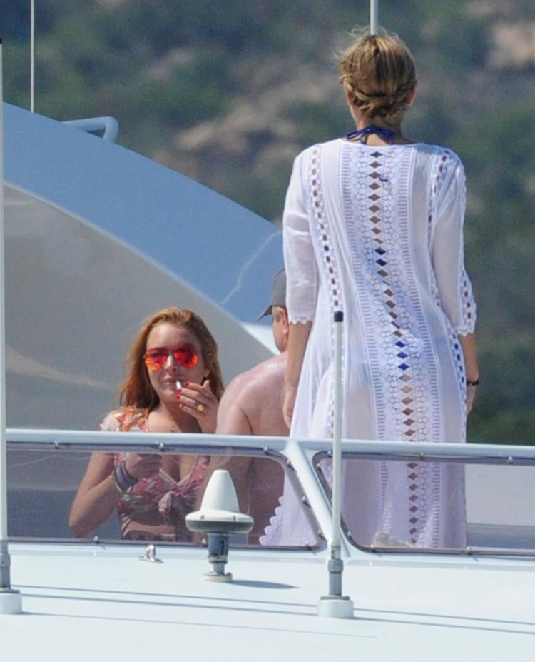 Lindsay Lohan and friend on yacht in Sardinia