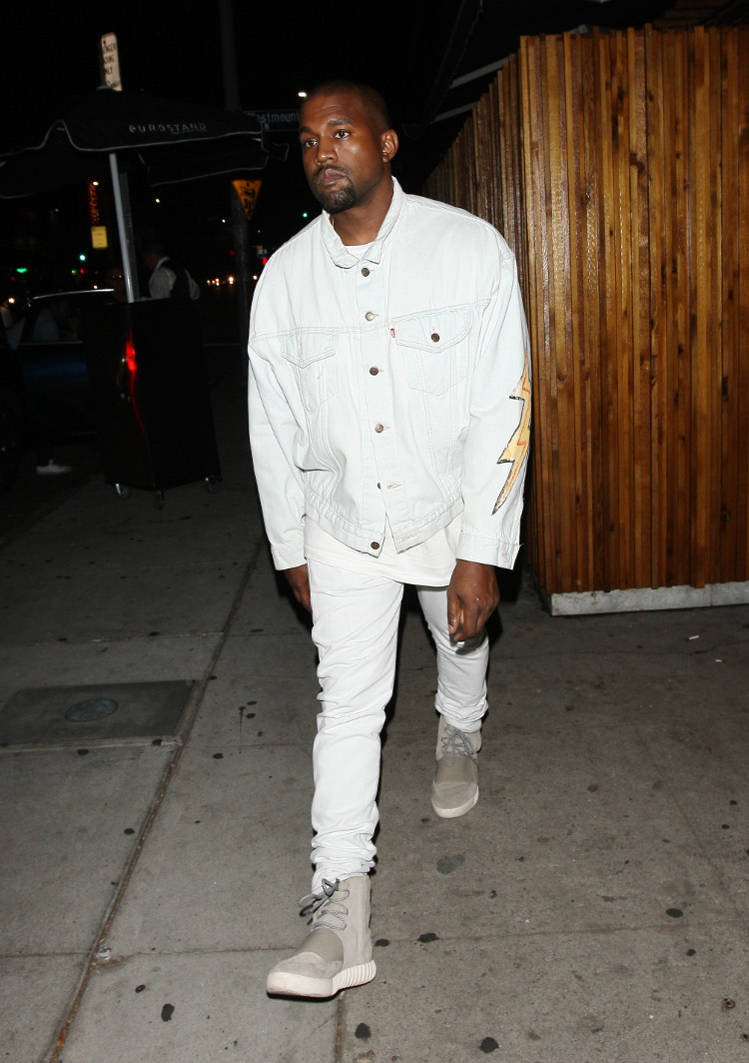 Kanye West parties at The Nice Guy club dressed all in white in West Hollywood, California on July 16, 2016.