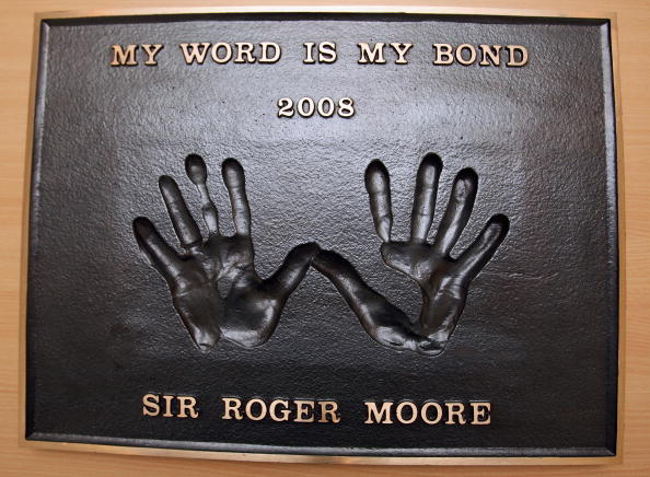 A cast of Sir Roger Moore's handprints displayed in The Odeon Cinema in London, England 