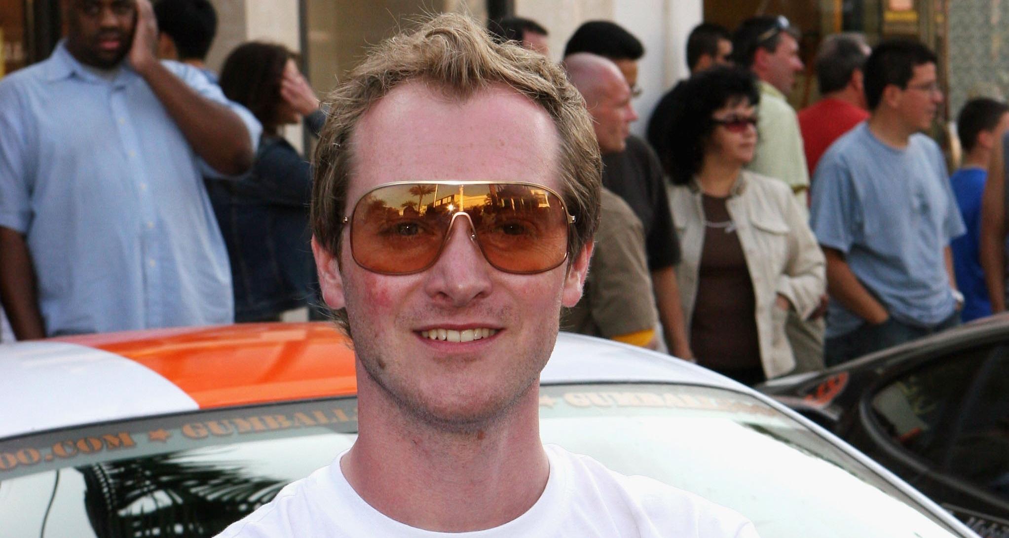 Gumball founder, Maximillion Cooper as the Gumball 3000 Rally comes to an end at the Rodeo Drive finish line on May 7, 2006 in Beverly Hills