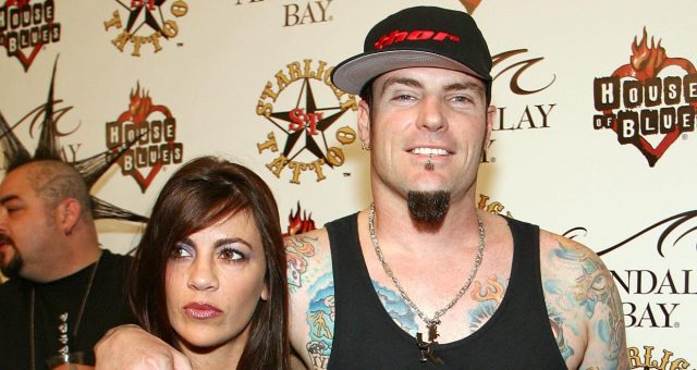 Music artist Rob 'Vanilla Ice' Van Winkle (R) and his wife Laura Van Winkle arrive at the grand opening of Mario Barth's Starlight Tattoo at the House of Blues