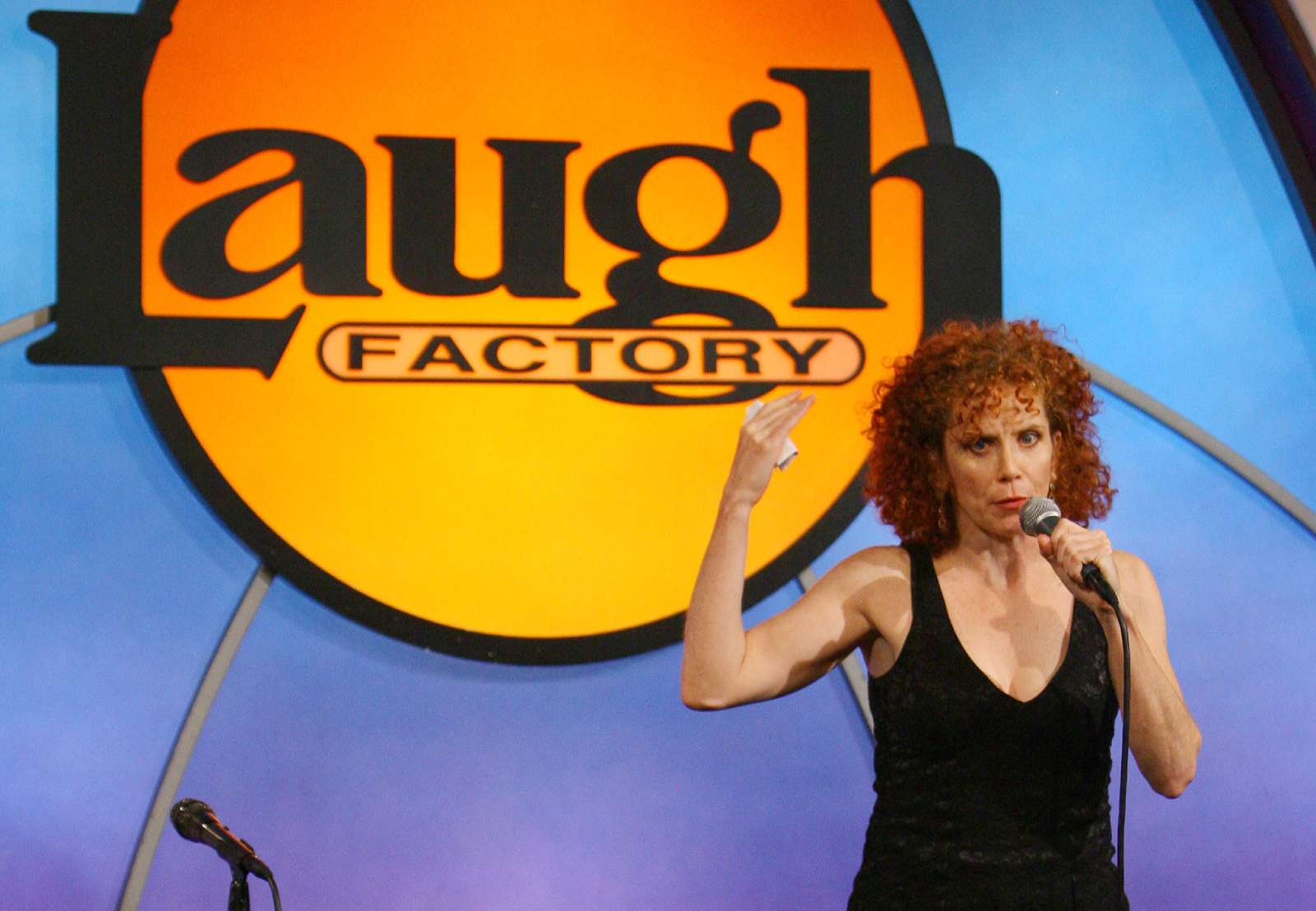 Amy Stiller performing a stand up comedy act