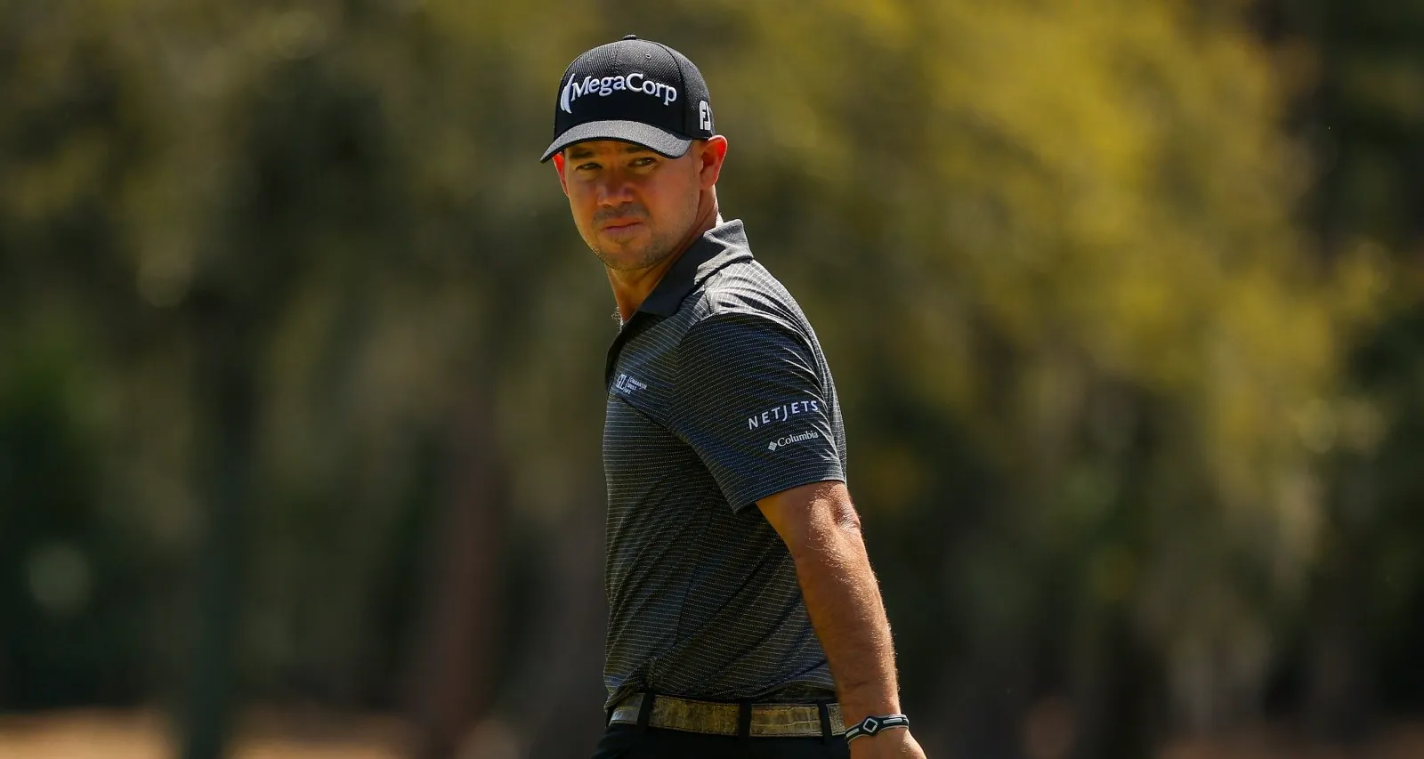 Are Brian Harman and Butch Harmon Related?